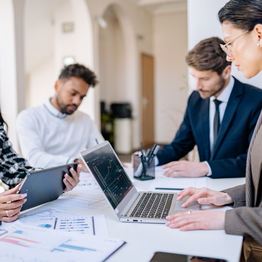Team planning a Claude Enterprise rollout in a modern office